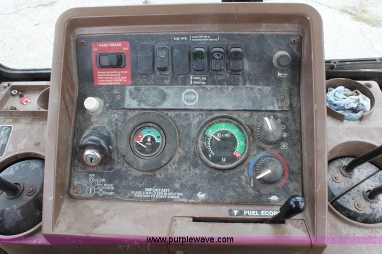 image for item E4106 1997 John Deere 310E backhoe