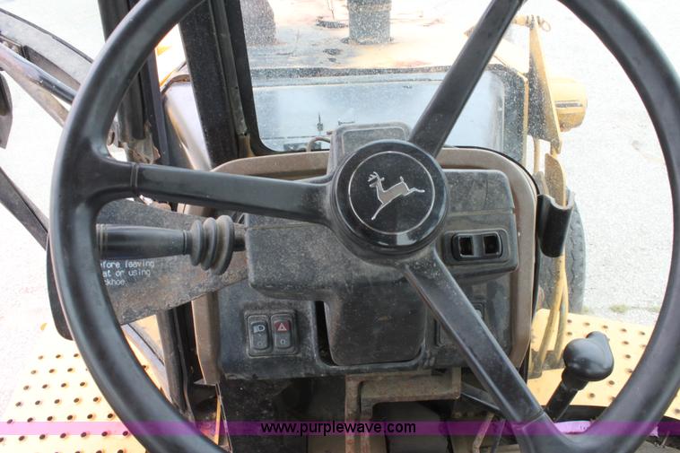 image for item E4106 1997 John Deere 310E backhoe