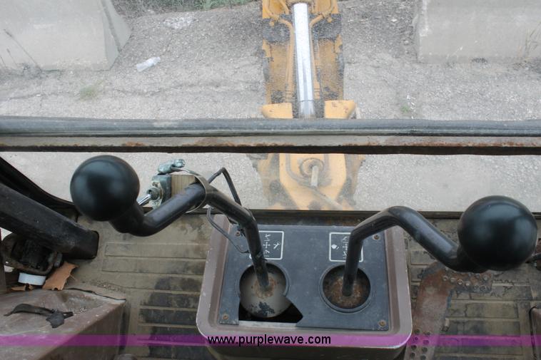 image for item E4106 1997 John Deere 310E backhoe