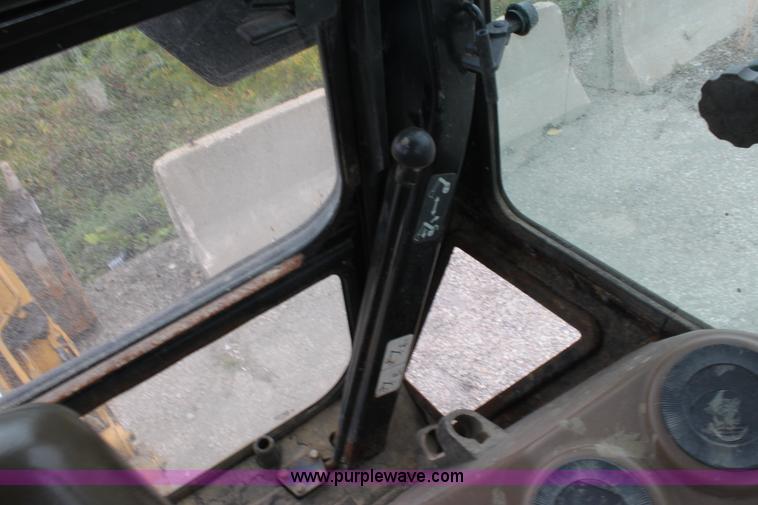 image for item E4106 1997 John Deere 310E backhoe