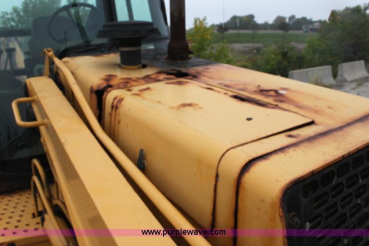 image for item E4106 1997 John Deere 310E backhoe