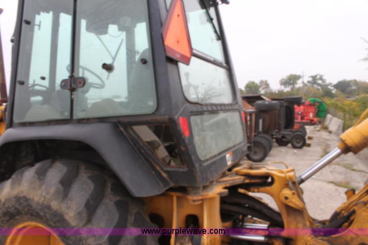 image for item E4106 1997 John Deere 310E backhoe