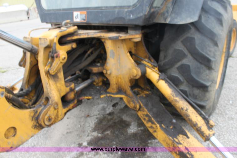 image for item E4106 1997 John Deere 310E backhoe