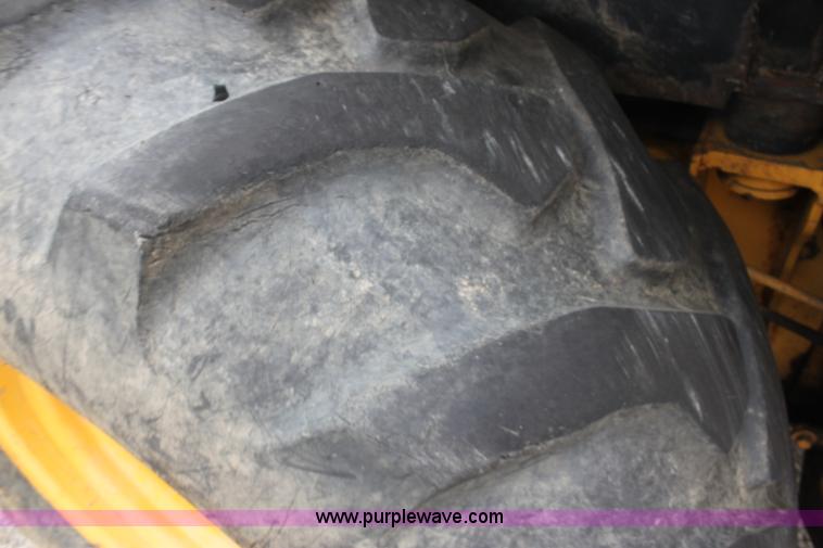 image for item E4106 1997 John Deere 310E backhoe