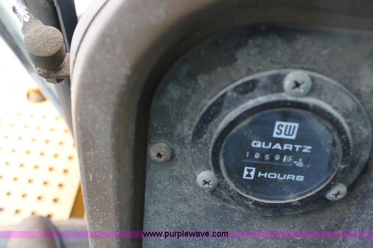 image for item E4106 1997 John Deere 310E backhoe