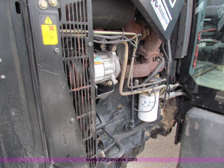 image for item E4117 2003 Ford TS100 tractor