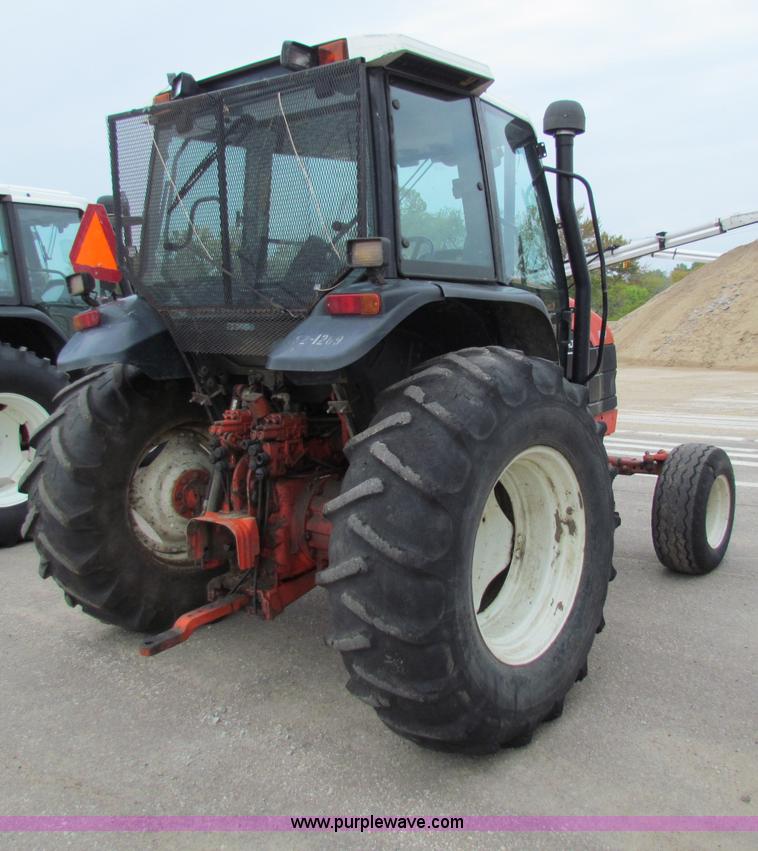 image for item E4118 1999 New Holland TS100 tractor