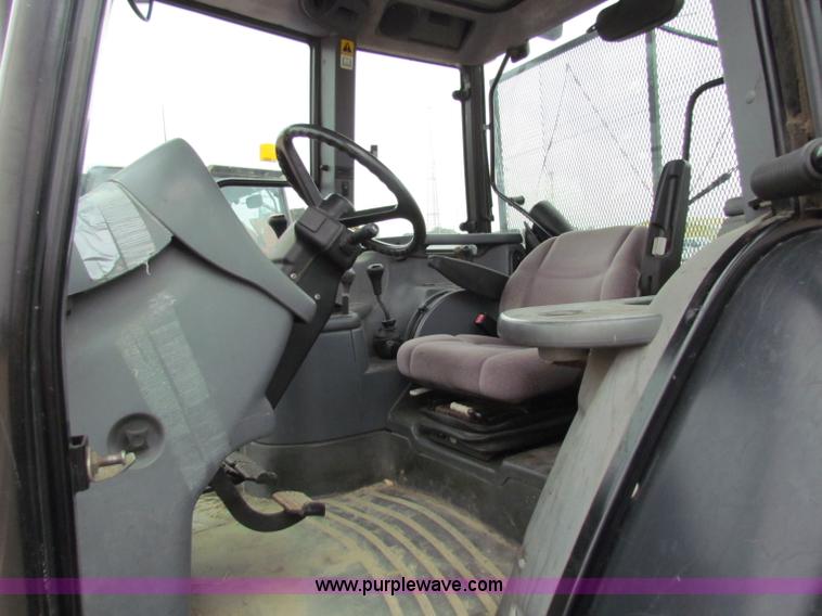 image for item E4118 1999 New Holland TS100 tractor