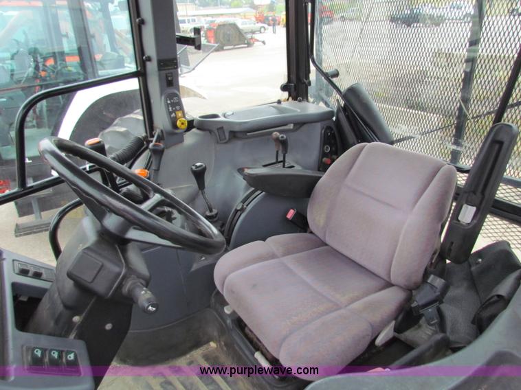 image for item E4118 1999 New Holland TS100 tractor