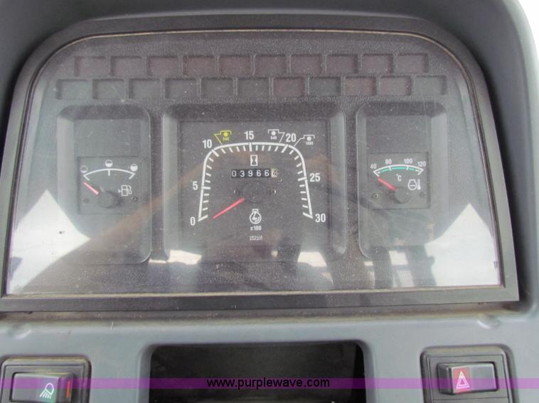 image for item E4118 1999 New Holland TS100 tractor