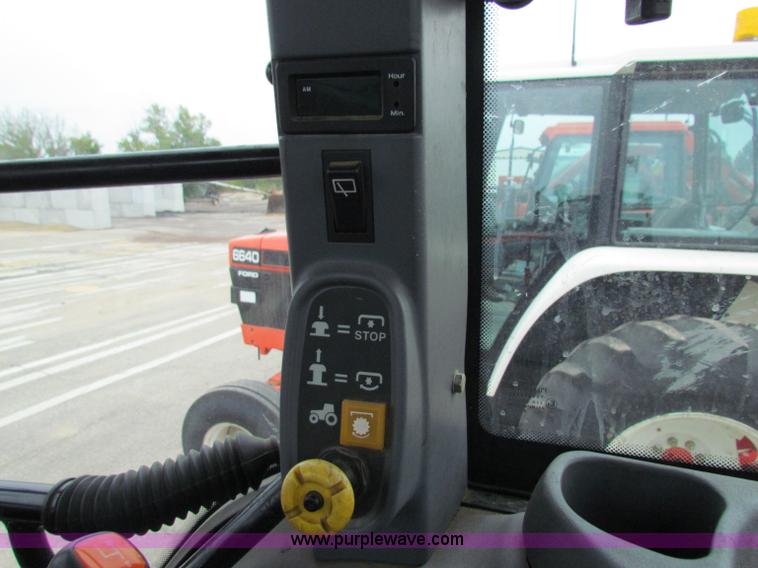 image for item E4118 1999 New Holland TS100 tractor