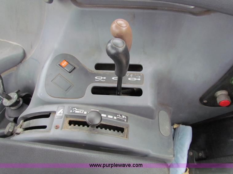 image for item E4118 1999 New Holland TS100 tractor