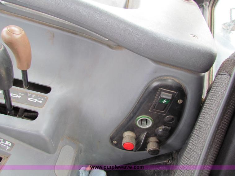 image for item E4118 1999 New Holland TS100 tractor