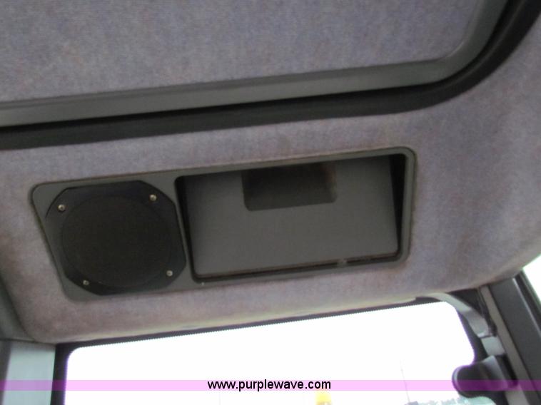 image for item E4118 1999 New Holland TS100 tractor