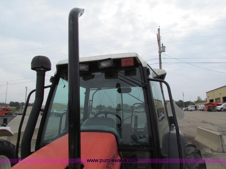 image for item E4118 1999 New Holland TS100 tractor