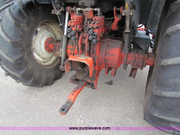 image for item E4118 1999 New Holland TS100 tractor