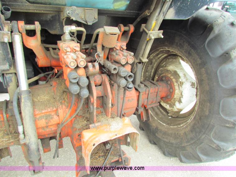 image for item E4118 1999 New Holland TS100 tractor