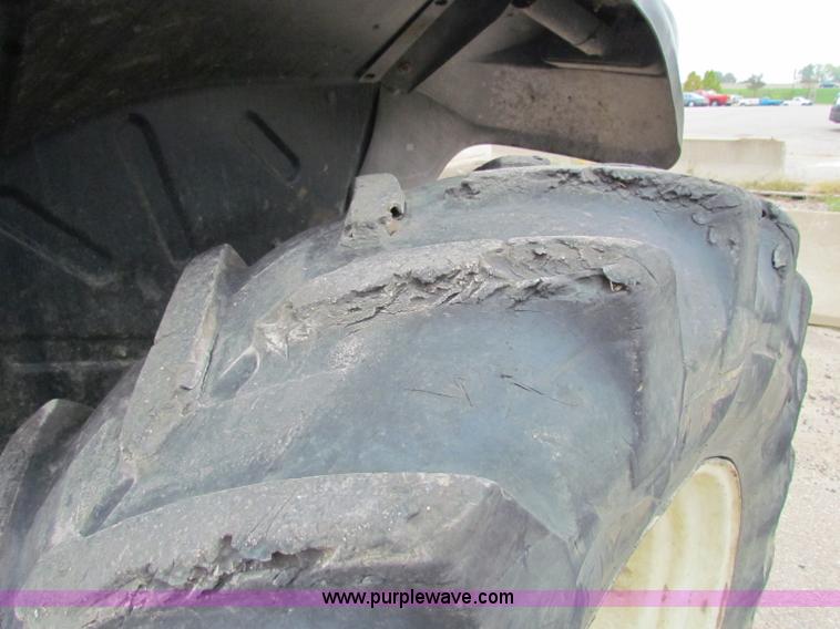 image for item E4118 1999 New Holland TS100 tractor