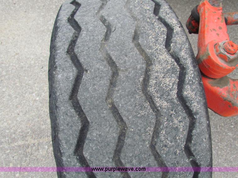 image for item E4118 1999 New Holland TS100 tractor