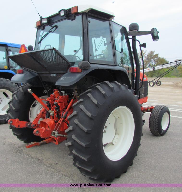 image for item E4121 1999 New Holland TS100 tractor