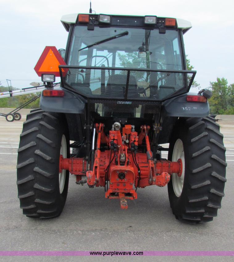 image for item E4121 1999 New Holland TS100 tractor