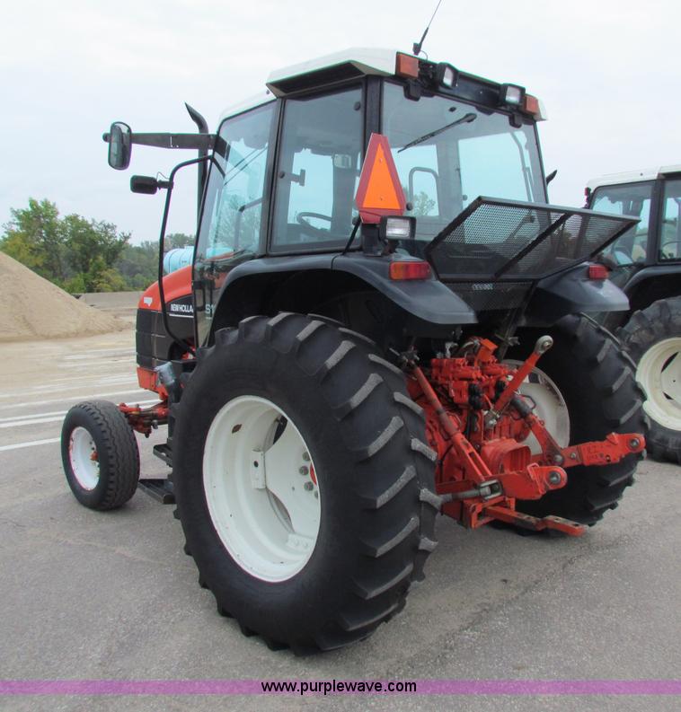 image for item E4121 1999 New Holland TS100 tractor