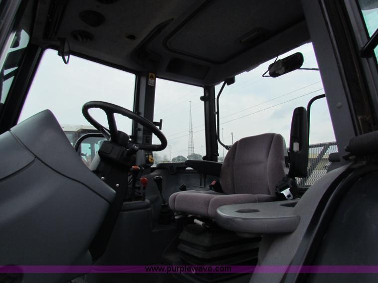 image for item E4121 1999 New Holland TS100 tractor