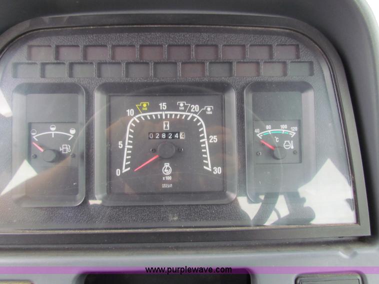 image for item E4121 1999 New Holland TS100 tractor