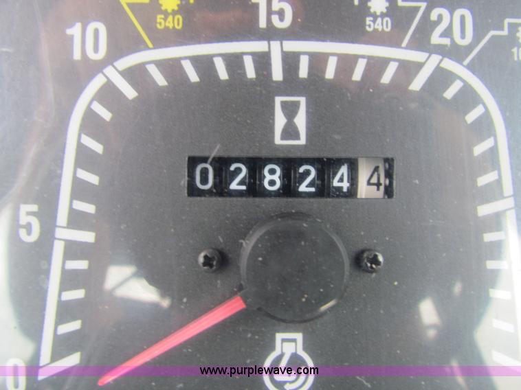 image for item E4121 1999 New Holland TS100 tractor