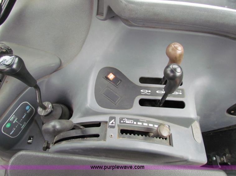 image for item E4121 1999 New Holland TS100 tractor