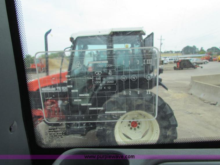 image for item E4121 1999 New Holland TS100 tractor