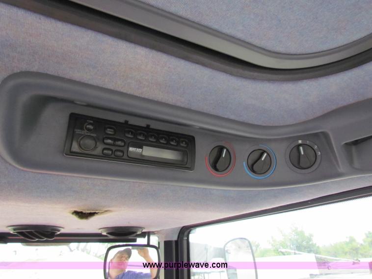 image for item E4121 1999 New Holland TS100 tractor