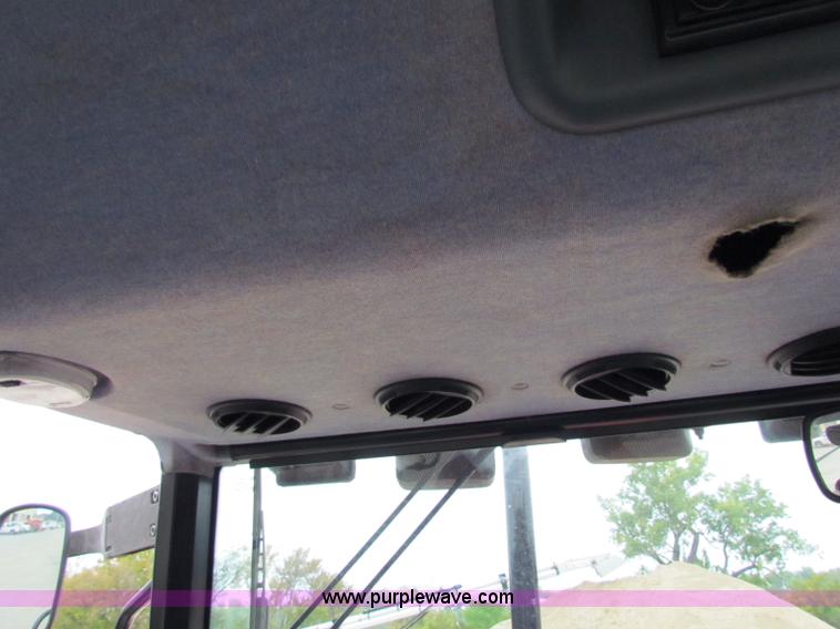 image for item E4121 1999 New Holland TS100 tractor