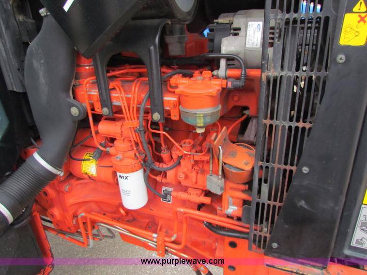 image for item E4121 1999 New Holland TS100 tractor