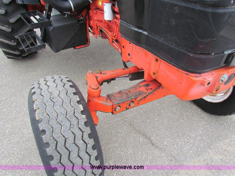 image for item E4121 1999 New Holland TS100 tractor