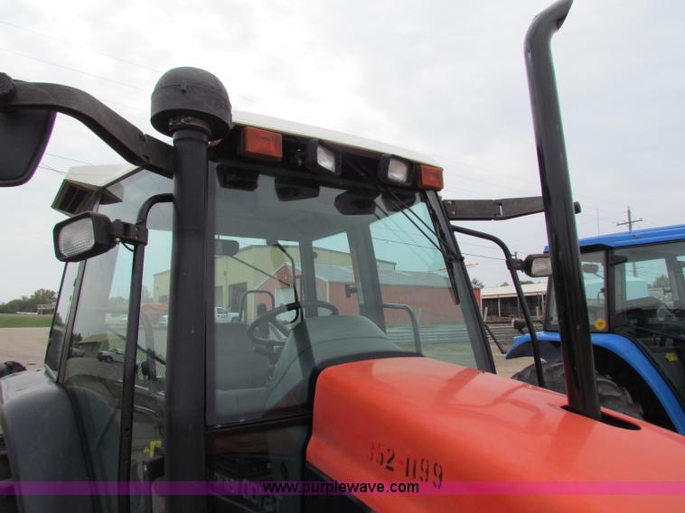 image for item E4121 1999 New Holland TS100 tractor