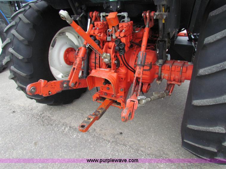 image for item E4121 1999 New Holland TS100 tractor