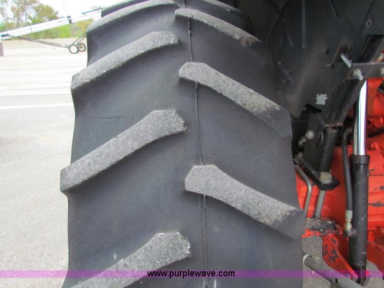 image for item E4121 1999 New Holland TS100 tractor