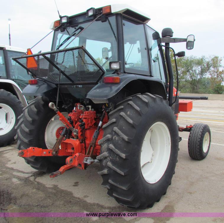 image for item E4123 1999 New Holland TS100 tractor