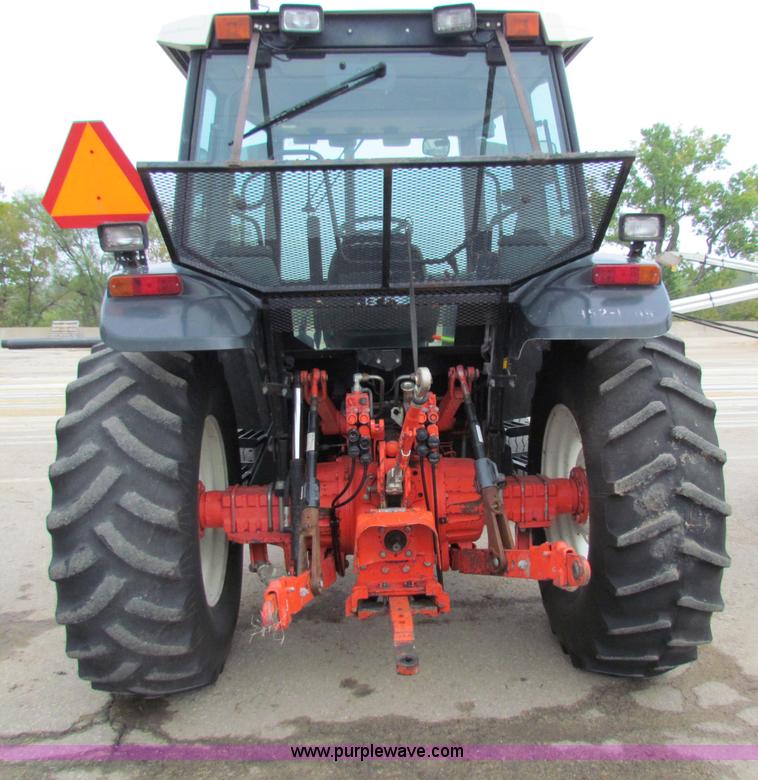 image for item E4123 1999 New Holland TS100 tractor