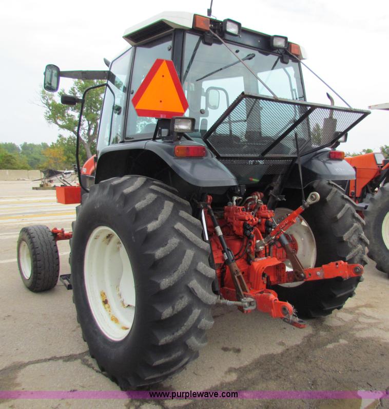 image for item E4123 1999 New Holland TS100 tractor