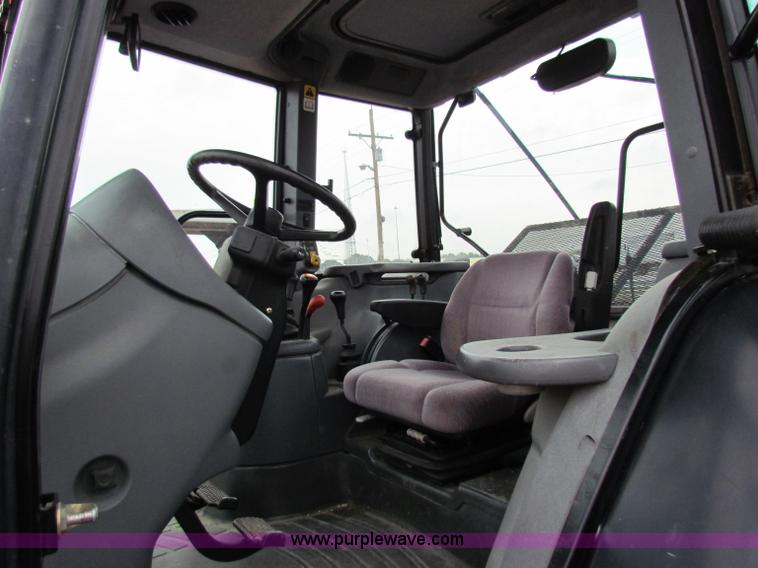 image for item E4123 1999 New Holland TS100 tractor