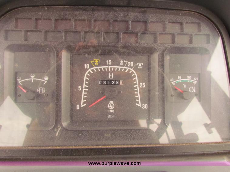 image for item E4123 1999 New Holland TS100 tractor