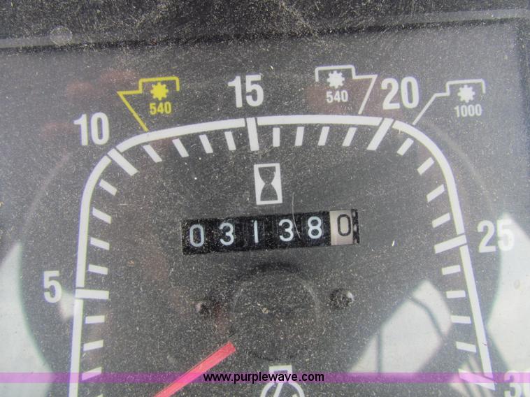 image for item E4123 1999 New Holland TS100 tractor