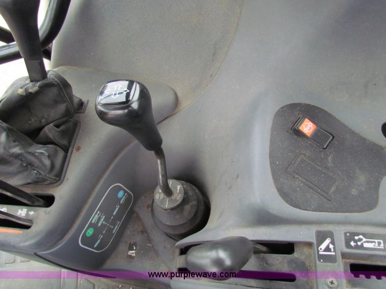 image for item E4123 1999 New Holland TS100 tractor