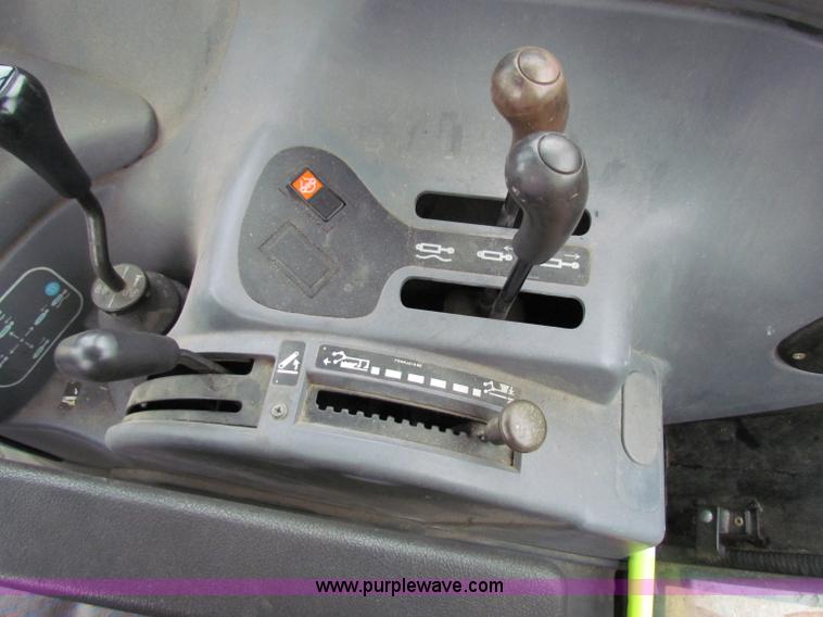 image for item E4123 1999 New Holland TS100 tractor