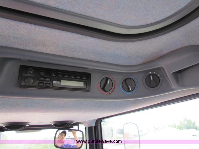 image for item E4123 1999 New Holland TS100 tractor