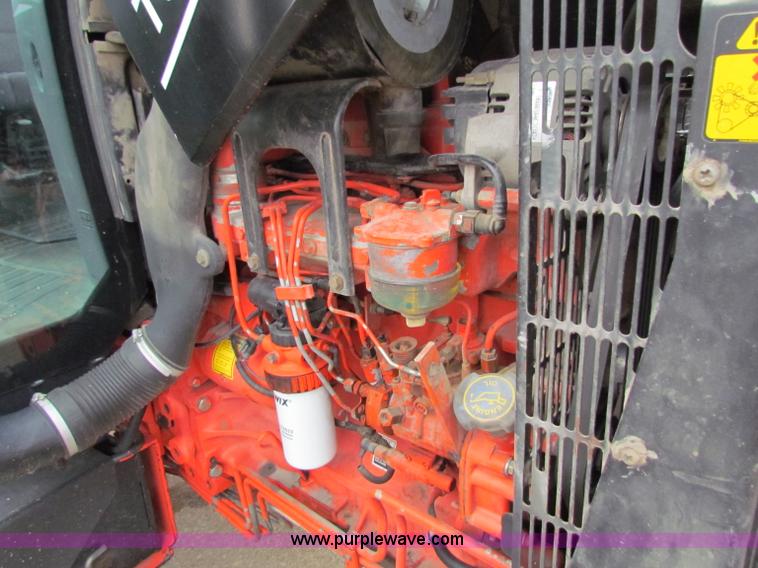 image for item E4123 1999 New Holland TS100 tractor