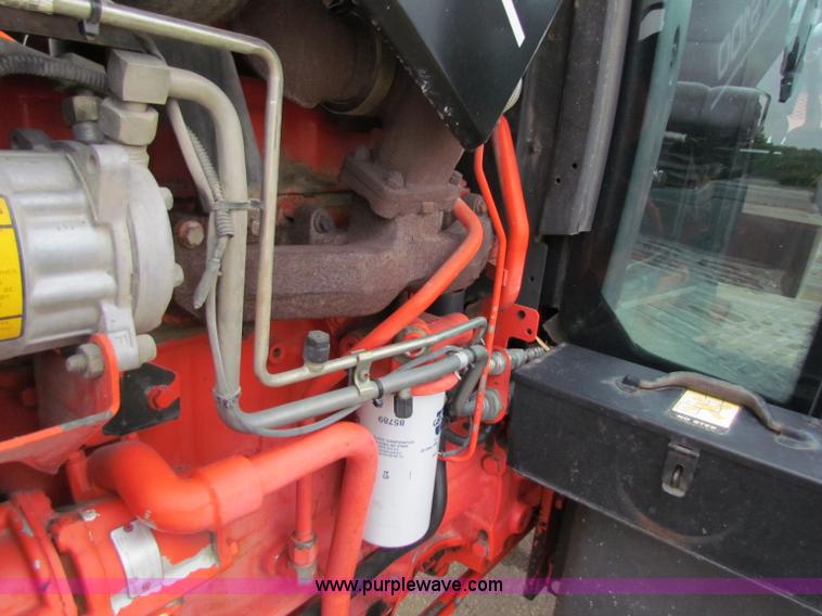 image for item E4123 1999 New Holland TS100 tractor