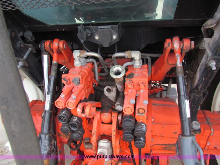 image for item E4123 1999 New Holland TS100 tractor